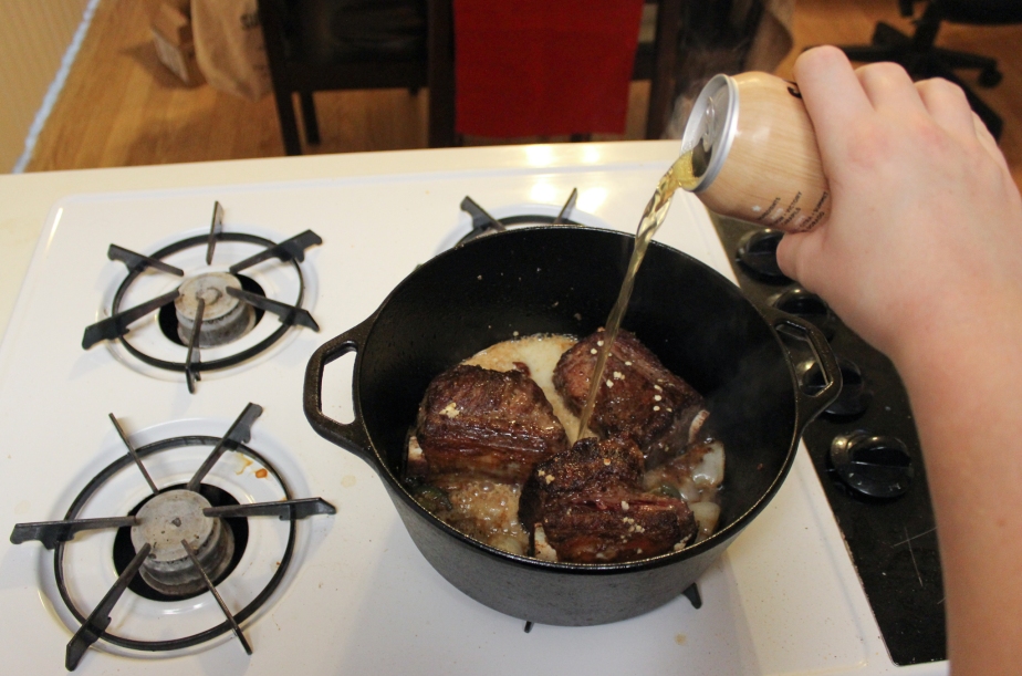 Beer braised beef short ribs in a Dutch oven